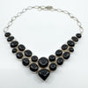 Chunky sterling silver black onyx necklace with cabochon stones in mixed bezel shapes