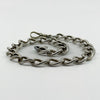 Low angle view of chunky antique sterling silver Albert chain with large oval links