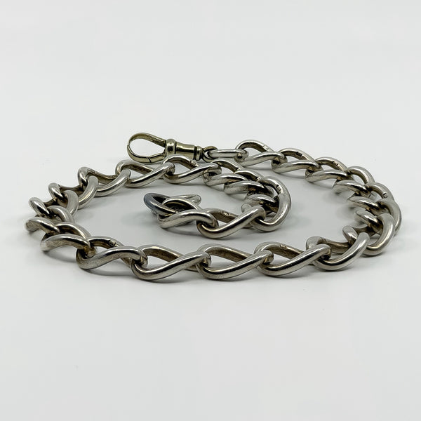 Low angle view of chunky antique sterling silver Albert chain with large oval links