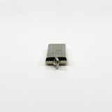 Side view of the chunky sterling silver ingot pendant showing the bail and rectangular depth.