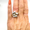 Modern chunky sterling silver wrap over ring shown worn on finger, size Q-R