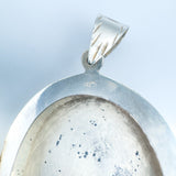 Interior view of vintage silver locket with 925 stamp