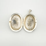 Inside of oval silver locket