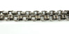 Close-up of the sterling silver Albert chain links, showing the hammered-style texture and chunky build.