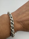 Bracelet worn on wrist showing scale and fit of twisted sterling silver links