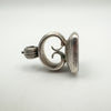 Ridged side profile of vintage sterling silver pendant