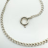 Detail of spring ring clasp on sterling silver chain stamped 'STERLING'