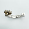 Close-up detail showing 925 sterling silver stamp on earring post