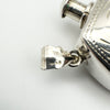 Detailed view of London 1994 import hallmarks and maker's mark HJ on silver bail