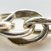 Detailed view of 925 hallmark stamped on silver chain link