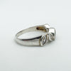Sterling silver ring showing smooth finish and prong-free setting