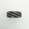 Detailed view of cognac and white diamond stripes in sterling silver band