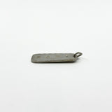 Close view of vintage sterling silver ingot pendant showing P&G Birmingham 1978 hallmarks.