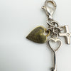 Close-up showing texture and colour of gold-plated heart charm