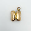 Vintage kidney bean locket in 18ct gold shown closed with both halves aligned