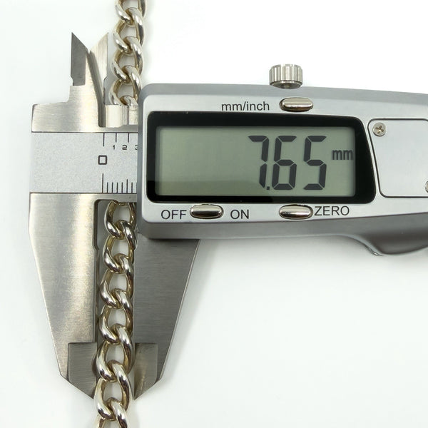 Sterling silver curb chain link width shown as 7.65mm.