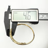 Depth of 9ct gold bangle measured at 4.6mm with caliper
