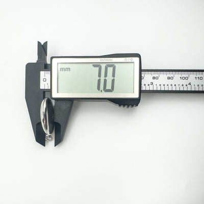 Digital calliper showing locket depth as 7.0mm