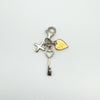 Sterling silver charm with diamond cross, gold-plated heart and key