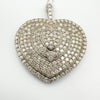 Close-up of diamond pavé setting in sterling silver heart