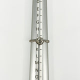 Antique platinum old-cut diamond solitaire ring shown on a ring size mandrel