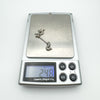 Sterling silver dragon barbell weighs 2.48g as shown on digital jewellery scale