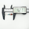 Measuring turquoise and coral earrings showing 42.1mm length
