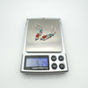 Turquoise and coral sterling silver earrings weighing 5.14g on digital scale