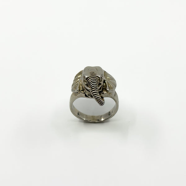 Front view of vintage sterling silver elephant locket ring with trunk, ears and wide band