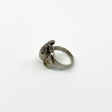 Side view of vintage sterling silver elephant locket ring with hinged head detail