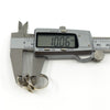 Vintage sterling silver elephant ring measured with digital calipers showing approx. 10.06mm depth