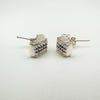 Side-facing view showing the depth and curve of chunky sterling silver earrings