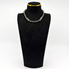 Antique sterling silver Albert chain shown on display bust with engraved bars and faceted round links