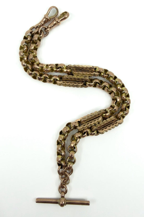 Antique rose gold Albert chain detail with chunky bar, square and oval faceted fancy links