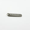 Vintage sterling silver ingot pendant lying flat with full hallmarks visible on the reverse.