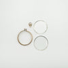 Complete breakdown of antique gold photo locket including frame, bail, and glass inserts
