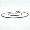 Angled view of the sterling silver flat link curb chain, showing the low-profile links.