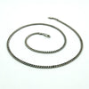 Full length view of the sterling silver flat curb chain with lobster clasp on a white background.