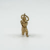 Straight-on view of vintage gold archer pendant highlighting detailed form