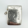Front view of antique sterling silver Vesta Case with blank shield and leaf engraving