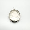 Oval sterling silver locket with foliate border and plain centre for engraving