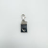 Sterling silver notebook pendant with heart-shaped cutout and diamond detail