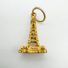 Close-up of vintage 9ct gold tower charm with hoop, London hallmark 1971
