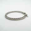 Sterling silver CZ full hoop earrings with hinged hooks closed together