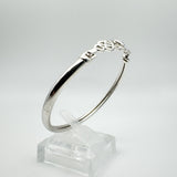 Side shot from the right showing the length of the bangle and display stand