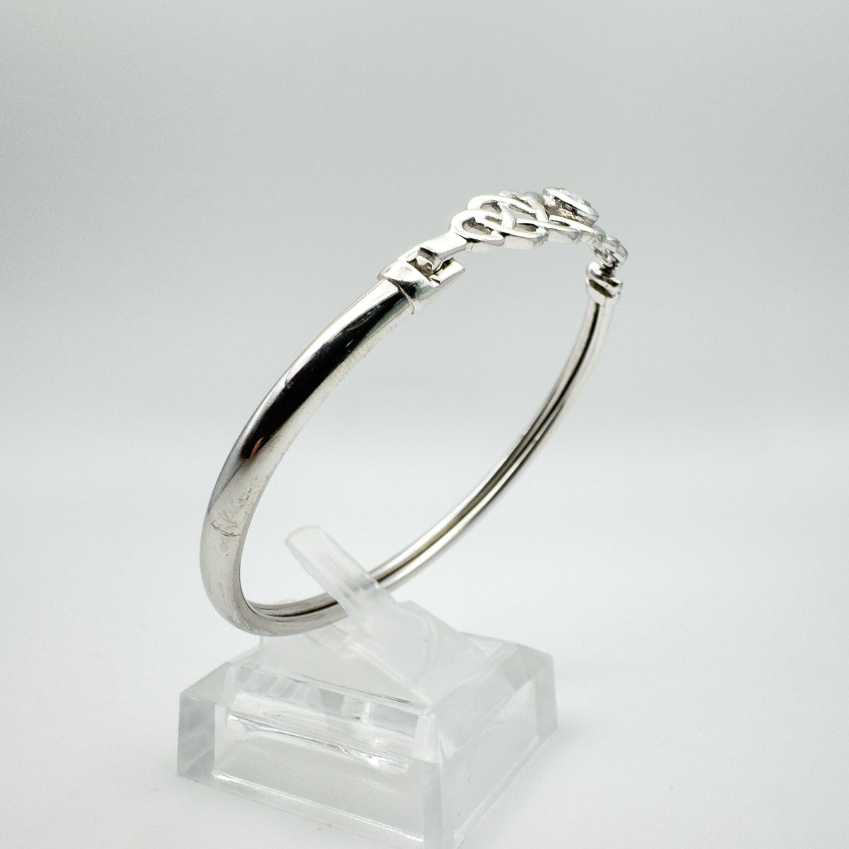Side shot from the right showing the length of the bangle and display stand