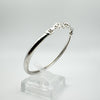 Side shot from the right showing the length of the bangle and display stand