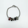 Sterling silver Trollbeads bracelet with floral clasp and glass charms