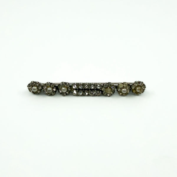 Sterling silver paste and pearl bar brooch in a straight line design, set with clear paste stones.
