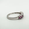 Side view of sterling silver band with TGGC and 925 marks visible inside the ring